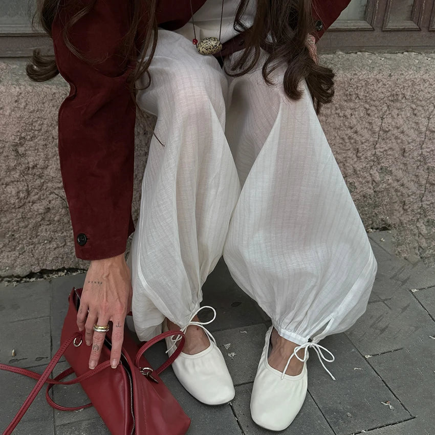 Linad Street Loose White Bloomers Pants Women Summer Elastic Waist Trousers Fashion Lace Up See Through Pants Female 2025 Sexy